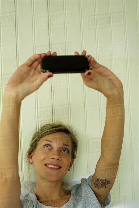Woman Taking Selfie Stock Photo Dissolve