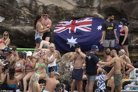 Thousands Defy Covid Rules And Strip Off To Swimwear For Beers In The