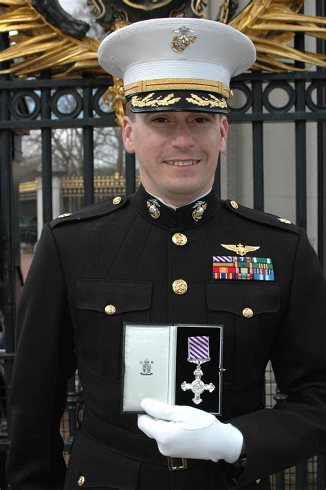 Major Receives Uks Distinguished Flying Cross At Buckingham Palace
