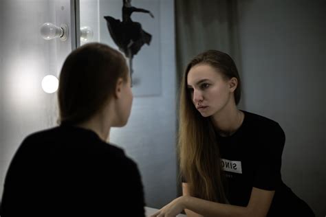 Girl Looking At Mirror Telegraph
