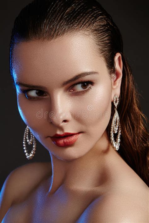 Beautiful Woman In Luxury Fashion Earrings Diamond Shiny Jewelry With