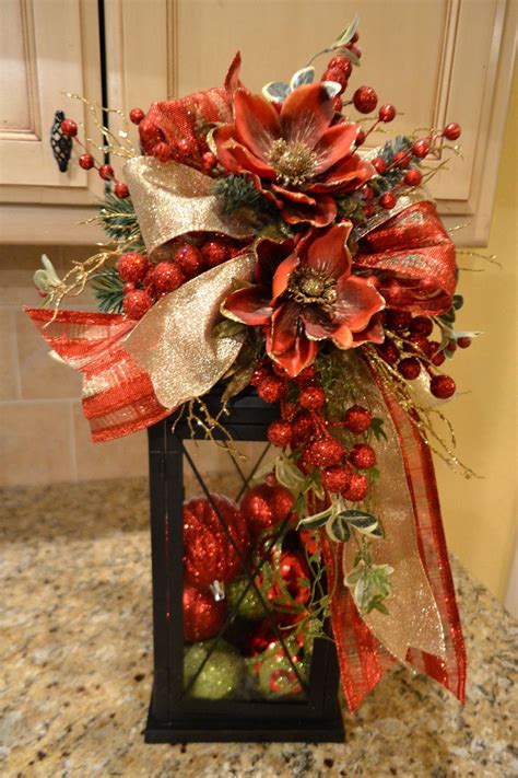 When you keep a lantern in your home you make it much. Elegant Red And Gold Lantern Swag | Christmas decorations ...