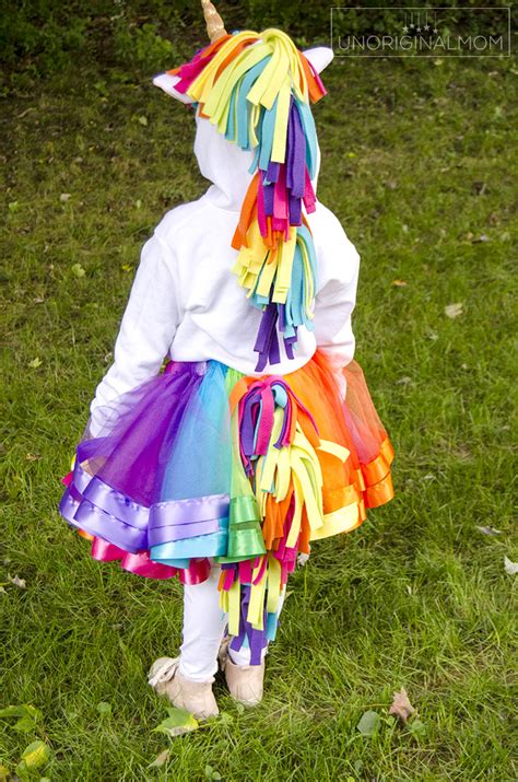 This unicorn tail would be perfect as part of a halloween costume or for playing dress up. DIY Unicorn Hoodie Costume with Rainbow Tutu - Tutorial! - unOriginal Mom