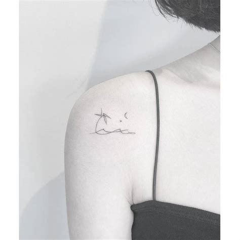 Minimalist Beach Tattoo On The Shoulder