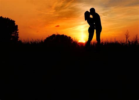 Couple Kissing Red Sunset Free Image Download