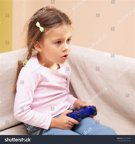 Young Girl Playing Video Game Blue Stock Photo 105179138