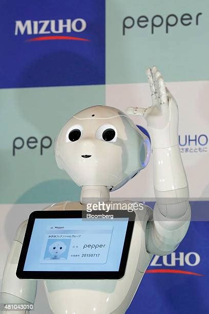 Softbank Group Corp S Pepper Robot Starts Work At A Mizuho Bank Branch Photos And Premium High