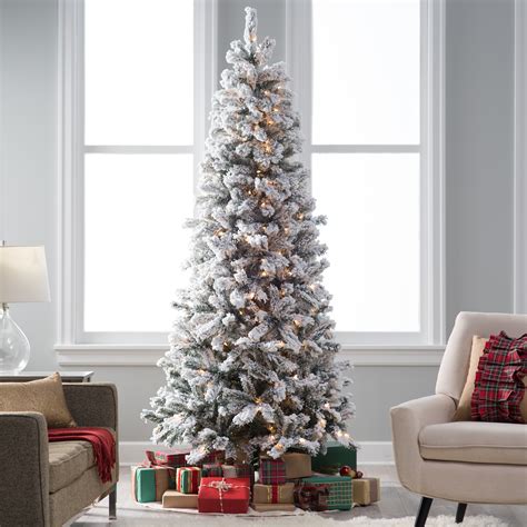 When you have a large living room or an office space that's generous enough to be filled with the greatness of a gigantic prelit christmas tree, this is the option that we would recommend. Classic Flocked Slim Pre-Lit Christmas Tree - Christmas ...