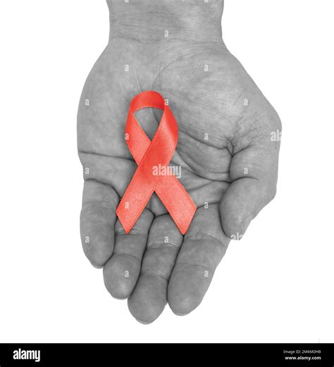Black And White Male Hand With Red Ribbon Bow Awareness Isolated On