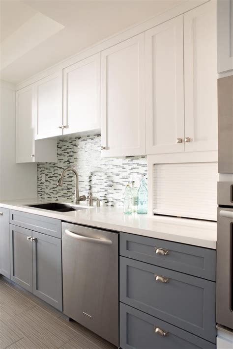 Blue and white cabinets done right with white quartz and white subway tile. Modern White Upper Cabinets and Dark Lower Cabinets ...