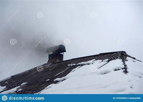 Smoke Rising From A Chimney In Winter Stock Photo Image Of House