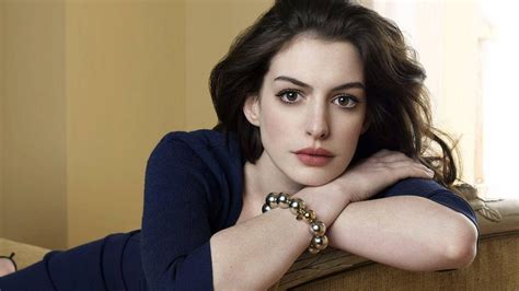 Elegance Anne Hathaway Is Wearing Blue Dress Leaning On Bed Hd Girls