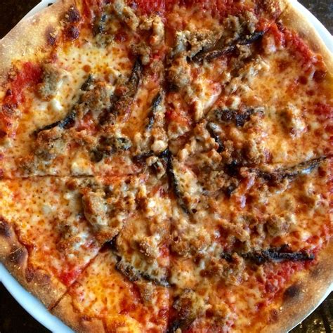 Funghi e Salsiccia Pizza - Crushed tomato sauce, mozzarella cheese ...