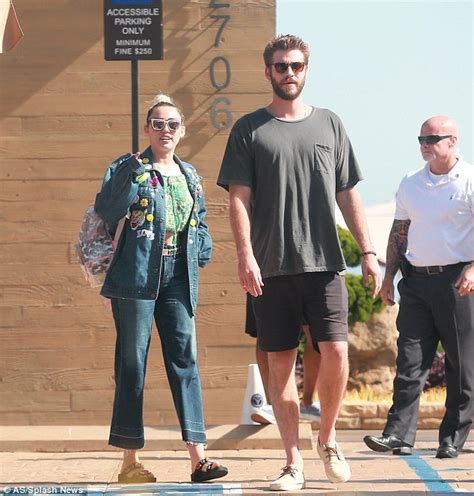 Miley Cyrus Dons Ill Fitting Double Denim With Fiancé Liam Hemsworth
