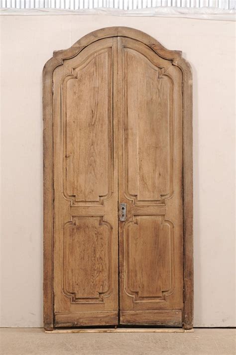 Exquisite Pair Of Arched 19th Century Spanish Carved Wood Doors With