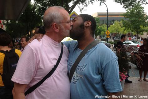 protesters take part in “kiss in” outside silver spring chick fil a