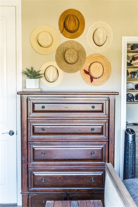 How To Create A Stylish Neutral Hat Wall Display In Your Home