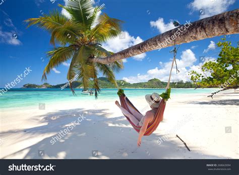 Relaxing Woman Hammock On Tropical Beach Stock Photo
