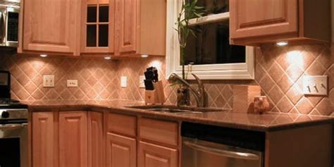 Blue kitchen cabinets with fantasy brown granite countertops. Granite Countertops And Backsplash Pictures Baltic Brown ...