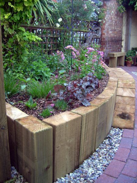 Add gravel or mulch between sections to create paths or textural. curved raised border - Google Search - Smalll Garden ideas - Garden Style - #Border #curved # ...