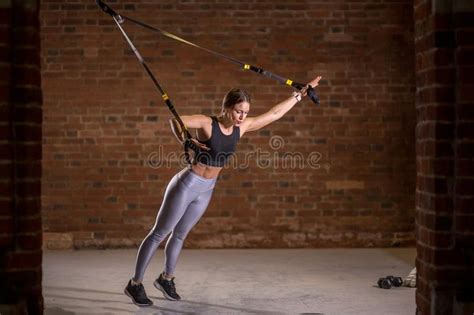 Fitness Woman Workout On Trx Straps In Gym Crossfit Style Training