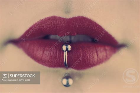 Close Up Of A Young Woman With Her Lip Pierced Superstock