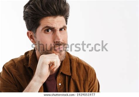 Brooding Young Unshaven Man Posing Looking Stock Photo 1929051977