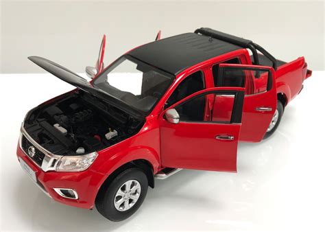 118 Dealer Edition Nissan Frontier Navara Pickup Truck Red Diecast
