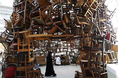 Artist Tadashi Kawamata Stacks Hundreds Of Chairs Into A 20 Foot High