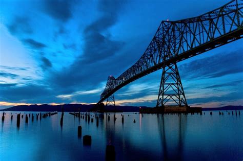 Sunset On The Astoria Bridge Which Connects Oregon Washington At The