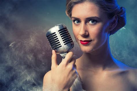 Attractive Female Singer With Microphone Stock Image Image Of Audio