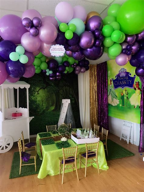 Balloon Garland Decoration For A Barney Birthday Party Artofit