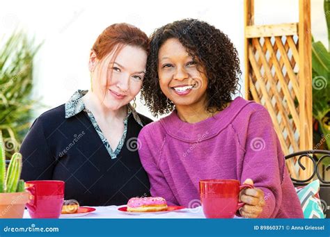 Happy Mixed Lesbian Couple Stock Image Image Of Outdoors 89860371