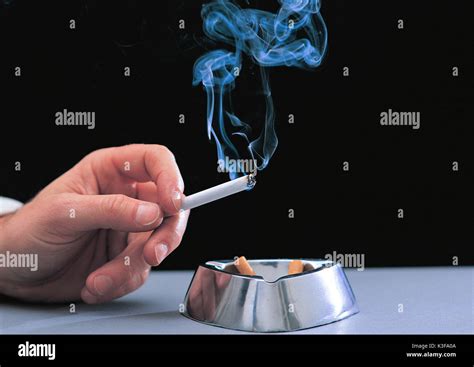 Burning Cigarette In An Ashtray Hi Res Stock Photography And Images Alamy