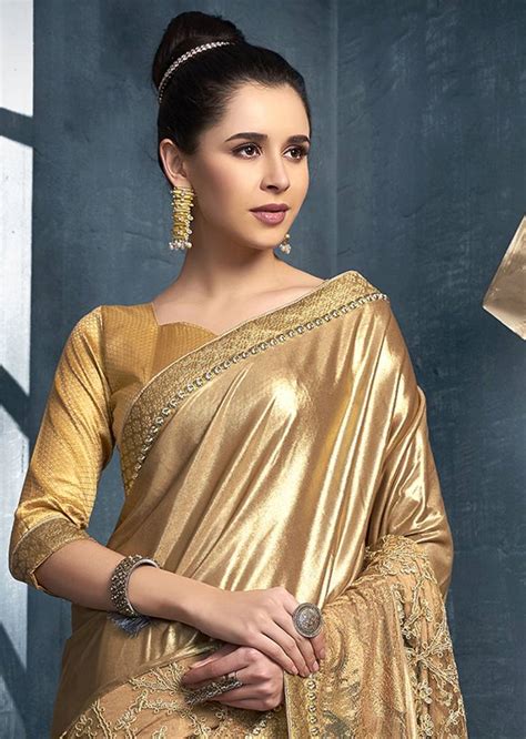 golden embroidered lycra saree with blouse triveni 3218954
