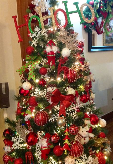 Festive Christmas Tree Decorated With Red Green And Gold
