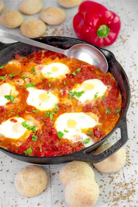 Shakshuka Recipe Eggs Poached In Bell Pepper And Tomato Sauce