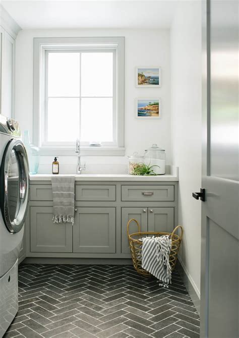 If you are lucky enough to have a laundry room, keep it looking tidy and useful with if you have the room and the budget, investing in built in laundry storage that would work perfectly in your space will allow you to use every inch efficiently. Hermosa Avenue - Kate Lester Interiors