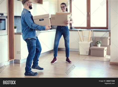 Couple Holding Boxes Image And Photo Free Trial Bigstock