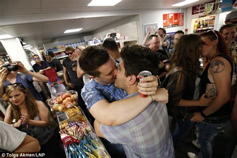 sainsbury s protesters hold kissathon after gay couple were thrown out for holding hands