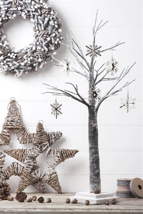 Snow Covered Christmas Tree Cover In Fairy Lights And Hang Sweets Or