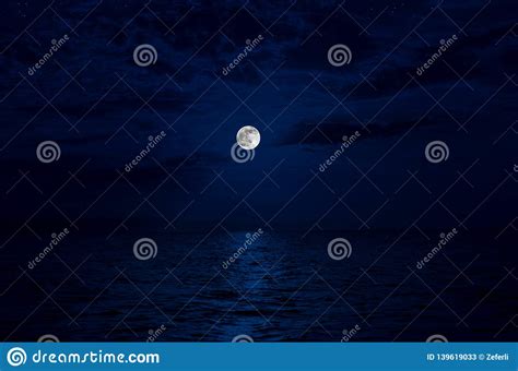 Full Moon Rising Over Sea At Night With Copy Space Big Full Moon