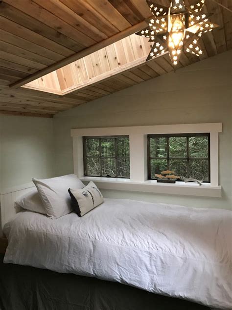 It features a number of windows that help keep the tiny home naturally bright and ventilated. Micro Shed Guest House | Tiny guest house, Guest house ...