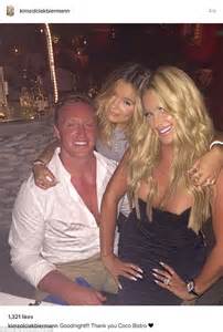 Kim Zolciak Flashes Cleavage With Husband Kory Biermann And Daughter