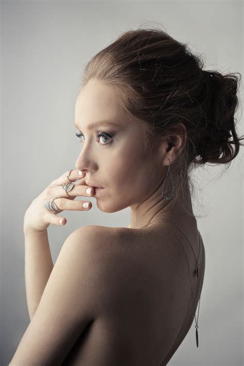 free photo woman wearing silver colored earrings posing beautiful photoshoot portrait
