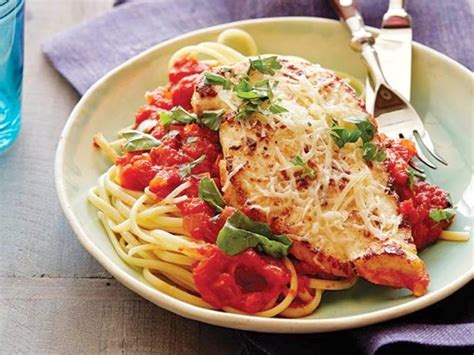Squeeze the juice of 1 of the lemons over the chicken, and then place the 4 lemon halves (if they fit!) inside the cavity of the chicken along with the 3 whole remaining sprigs of rosemary. Chicken Parmigiana Recipe | Ree Drummond | Food Network