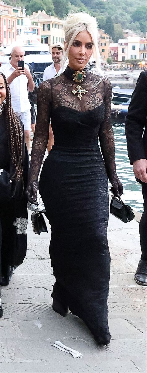 Kim Kardashian Wears Sheer Lace Dress And Silver Corset To Kourtneys Wedding And Reception