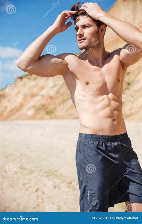 Attractive Shirtless Young Man Standing On Beach Stock Image Image Of