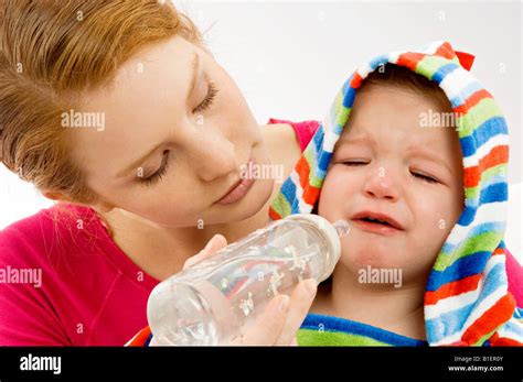 Crying Baby Bottle Feeding Hi Res Stock Photography And Images Alamy