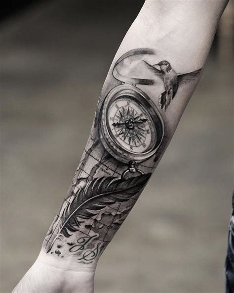 Compass Flying Bird And Feather Forearm Tattoo Design Ideas Compass Tattoo Design Ideas Me